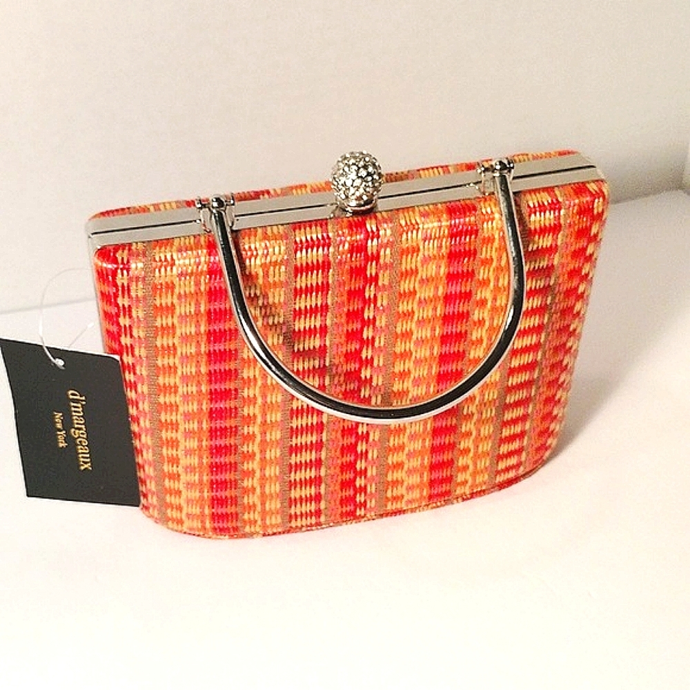 d'margeaux clutch purse silver chain strap and silver handle.